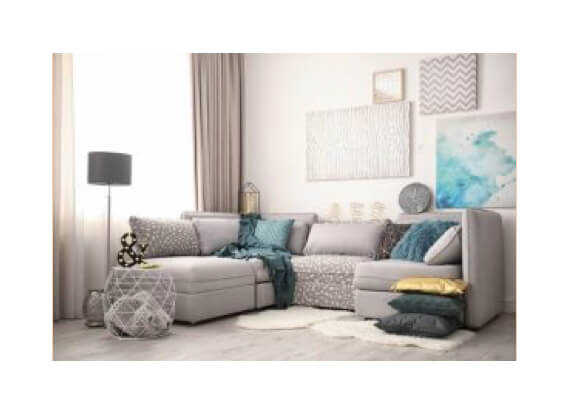 Grå chaiselongsofa.