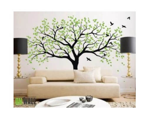 Vægklistermærker af træ og fugle på stuevæg.