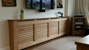 Denne løsning er et møbel, der fuldstændig gemmer den skjulte radiator