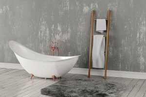 En badekar med en stige til at hænde håndklæder