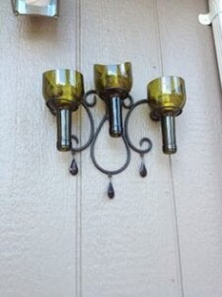 Vinflasker kan bruges til hjemmelavede stearinlysholdere